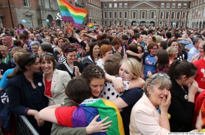 Supporters react outside Dublin Castle following the announcement of the result of the same-sex marriage referendum in Dublin on May 23, 2015. Ireland on Saturday became the first country in the world to approve gay marriage by popular vote as crowds cheered in Dublin in a spectacular setback for the once all-powerful Catholic Church.    AFP PHOTO /  PAUL FAITH        (Photo credit should read IAN KINGTON/AFP/Getty Images)